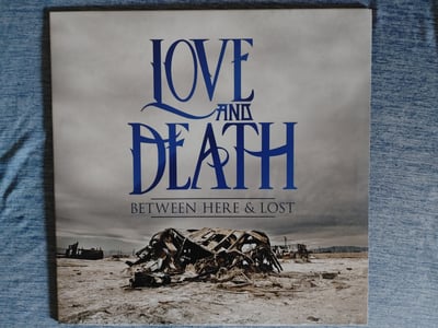 Love And Death - Between Here And Lost [Clear w/Black & Blue Splatter|#300]