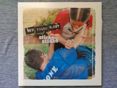 New Found Glory - Sticks And Stones [Clear Blue in Ultra Clear w/Multi Color Splatter|#1000]
