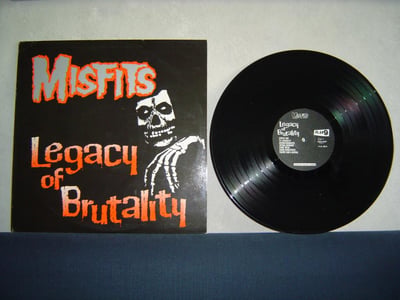 MISFITS: Legacy Of Brutality (Orange logo, Thin, translucent vinyl with M2 extra etchings. No barcode)